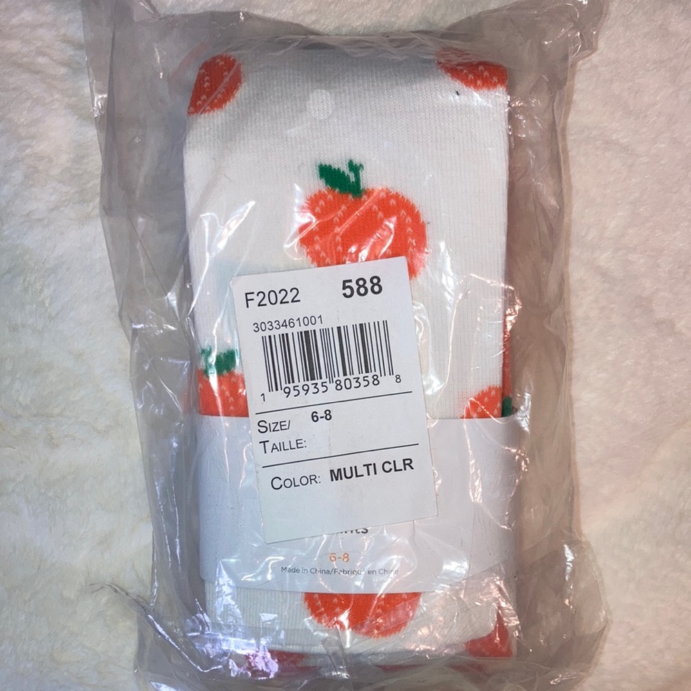 The Children’s Place pumpkin & stripe tights